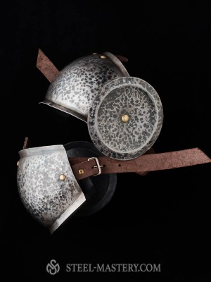 Elbow caps with chased rondel Metal bracers, couters and full arms