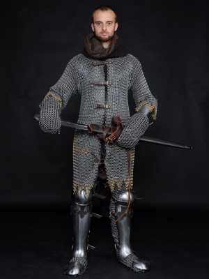 Hauberk with forward fastenings Chain mails and hauberks