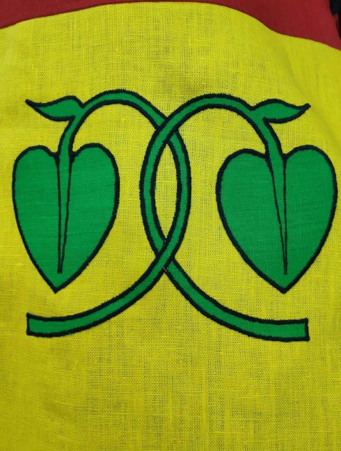 QUARTER COLORED TABARD WITH FIVE HERALDIC SYMBOLS Tronc