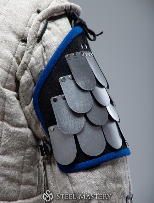 Scale spaulders, part of steel scale armor Scale and mail gauntlets and mittens