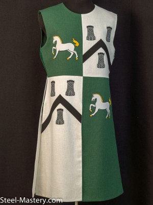 QUARTER COLORED TABARD WITH HORSES AND TOWERS