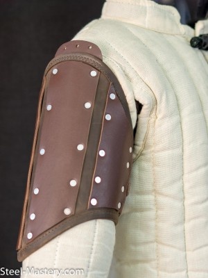BROWN LEATHER PROTECTION OF UPPER PART OF ARM 