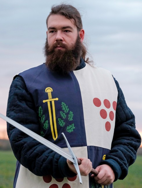 Tabard with silk-screening of scarlet dots, golden swords, and green oak leaves 