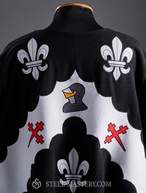 Black tabard with a helmet, white lilies and crosses Tabards