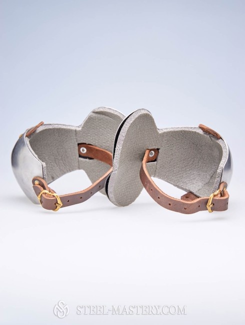 Steel elbow caps with additional shock absorbing layer  Listo para enviar