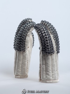 Padded gauntlets with chain mail protection in stock