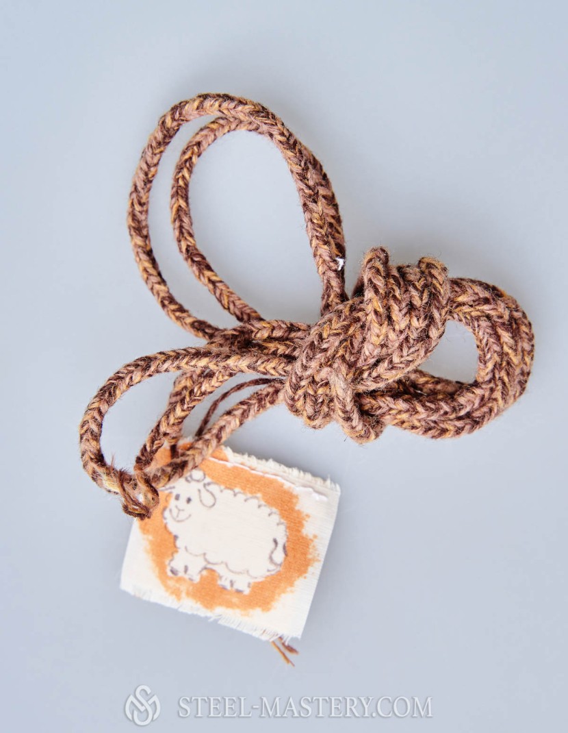 Wet sand wood lacing cord photo made by Steel-mastery.com