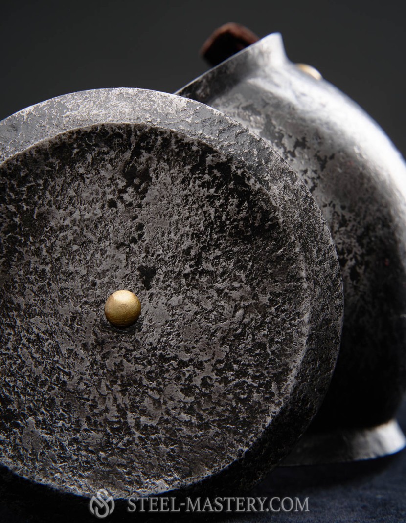 Elbow caps with plain rondel photo made by Steel-mastery.com